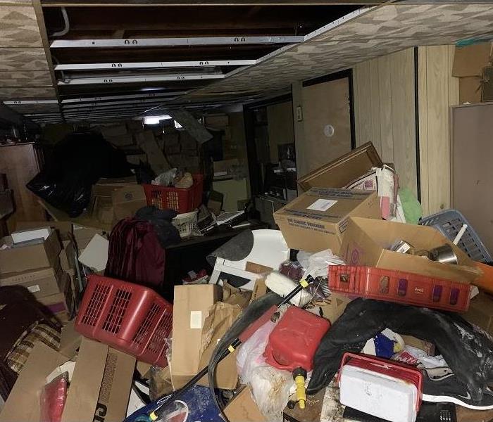Room filled with garbage, contents.