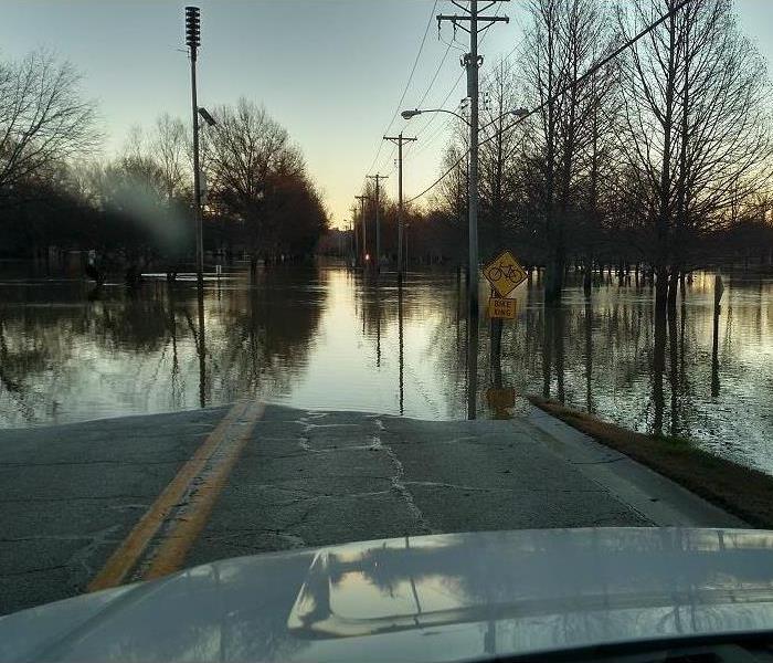 Flood waters covering a road
