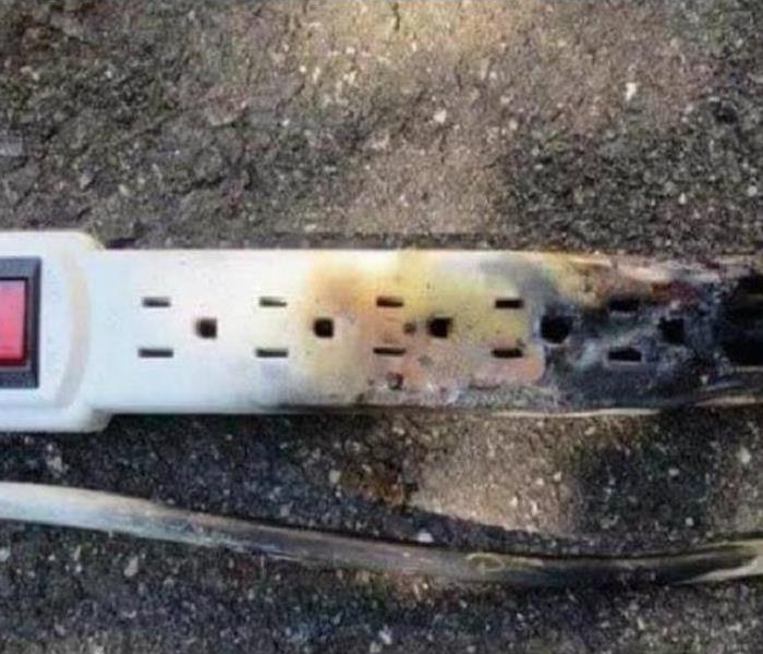 A power strip that briefly caught on fire.