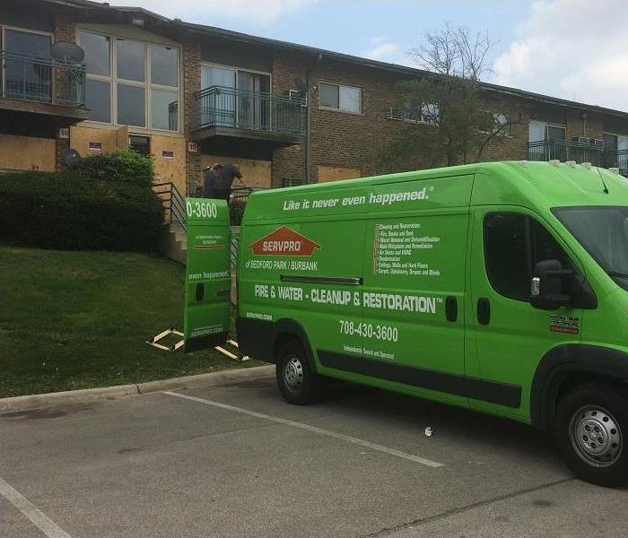 SERVPRO vehicle in front of an apartment building that suffered a fire