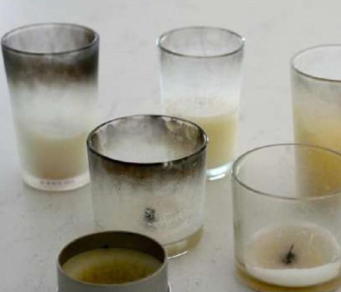 Soot-stained candle jars